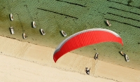 Paragliding over beach