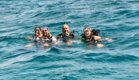 Val, Eric, Chuck and Chele ready to dive