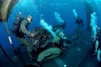 US Navy Seals exiting submarine